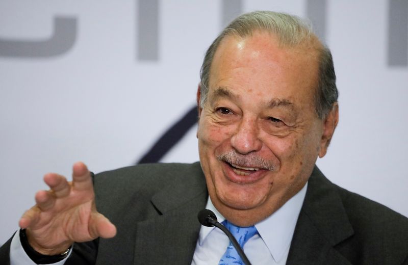 FILE PHOTO: Mexican billionaire Carlos Slim attends a news conference