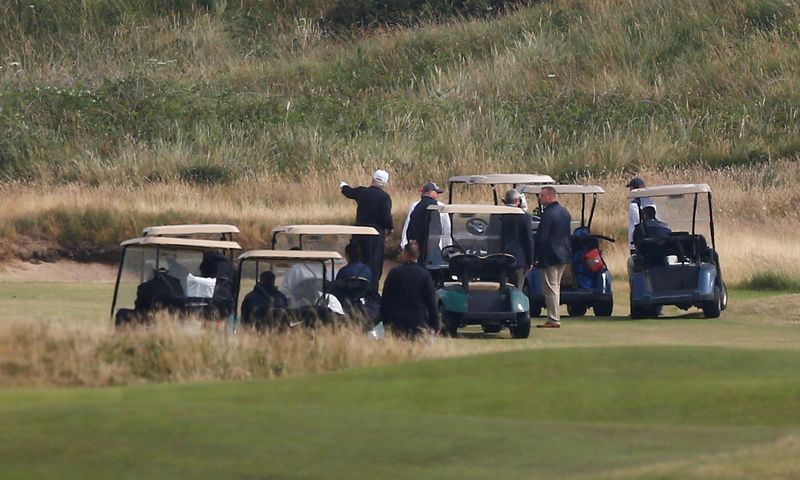 FILE PHOTO: U.S. President Donald Trump gestures on the course