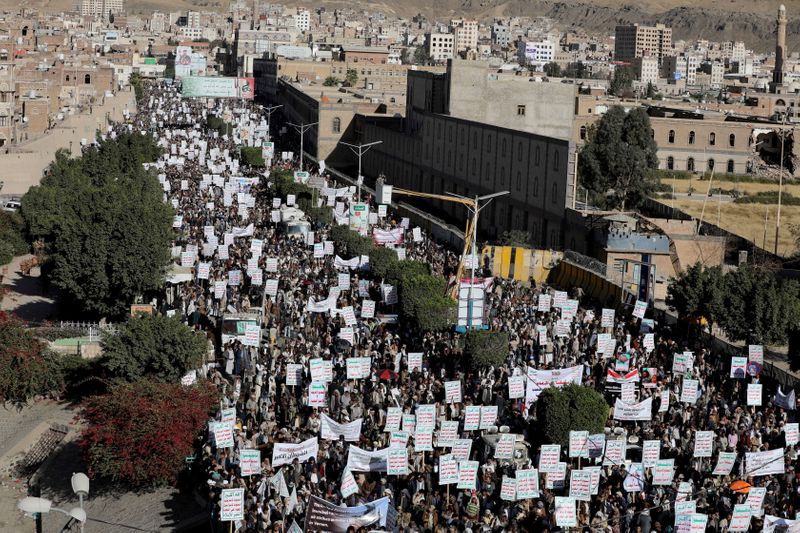 Houthi supporters rally against the United States’ designation of Houthis
