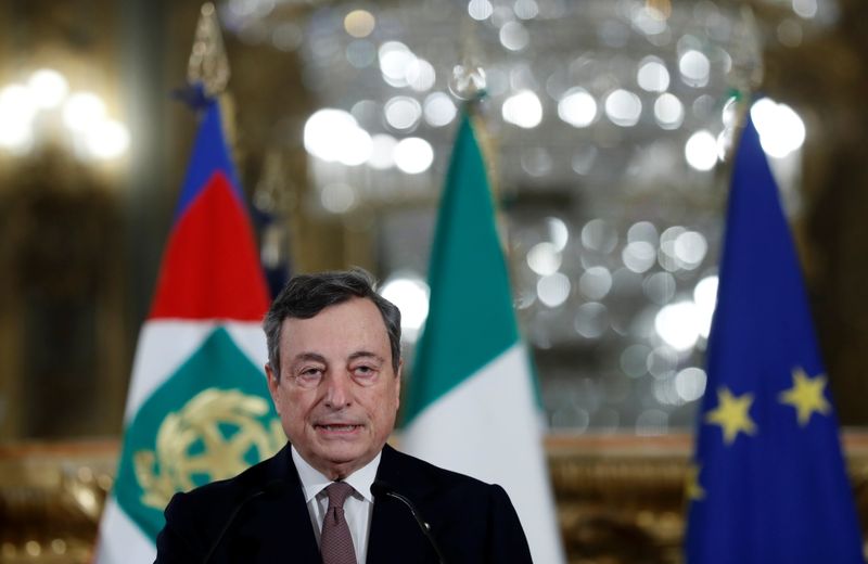 Incoming Italian Prime Minister Mario Draghi speaks to the media