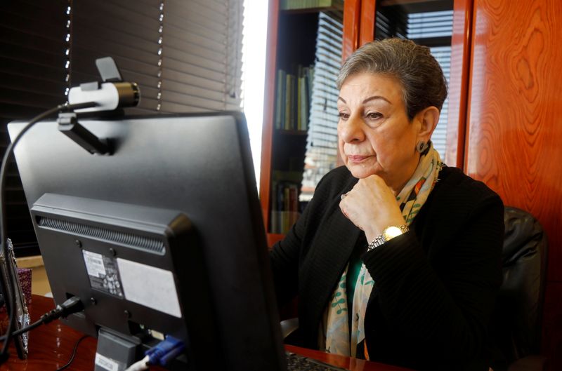 Palestinian politician Hanan Ashrawi gestures during an interview with Reuters,