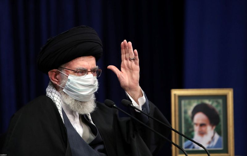 Iran’s Supreme Leader Ayatollah Ali Khamenei wears a mask during