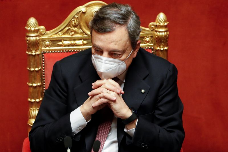 Italy’s Prime Minister Mario Draghi attends a debate at the