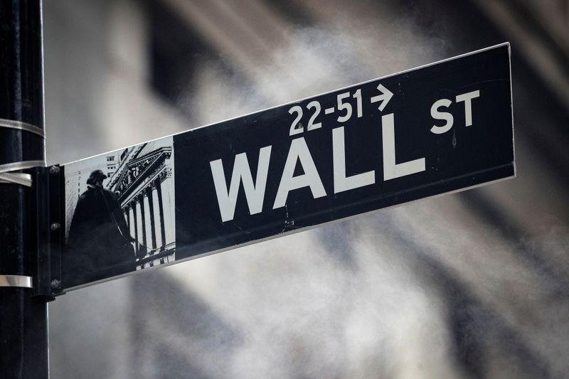 The Wall St. sign is seen outside the NYSE in