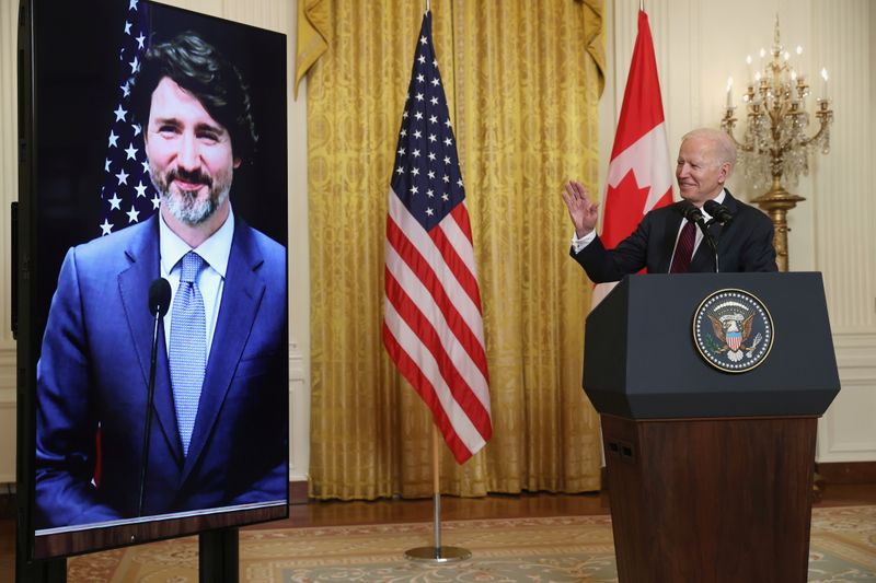 U.S. President Joe Biden gestures to Canada’s Prime Minister Justin