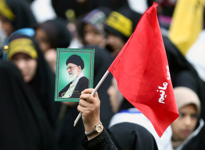 FILE PHOTO: An Iranian protester holds the picture of Iranian