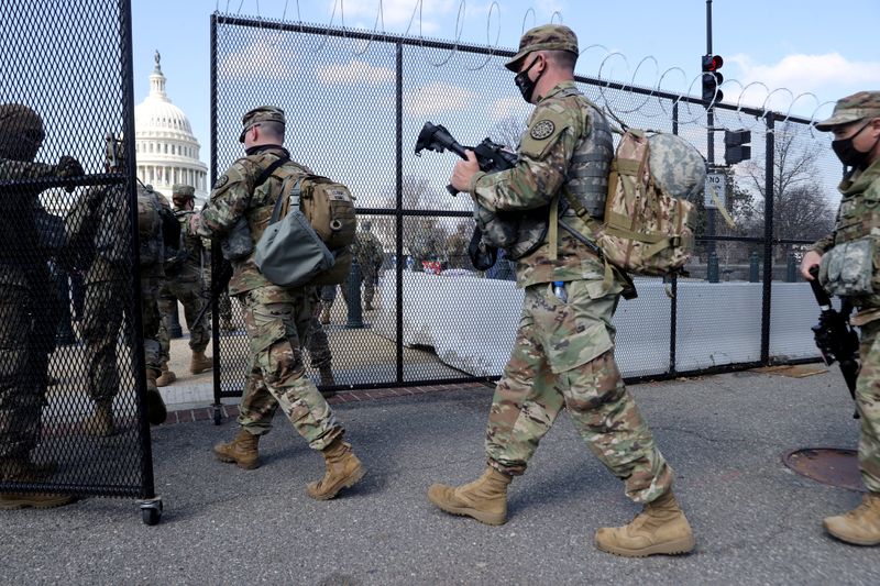FILE PHOTO: National Guard soldiers patrol the grounds of the