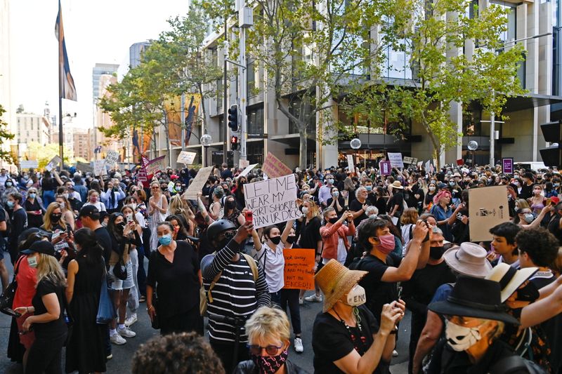 Protesters rally following sexual assault allegations in Australian government in