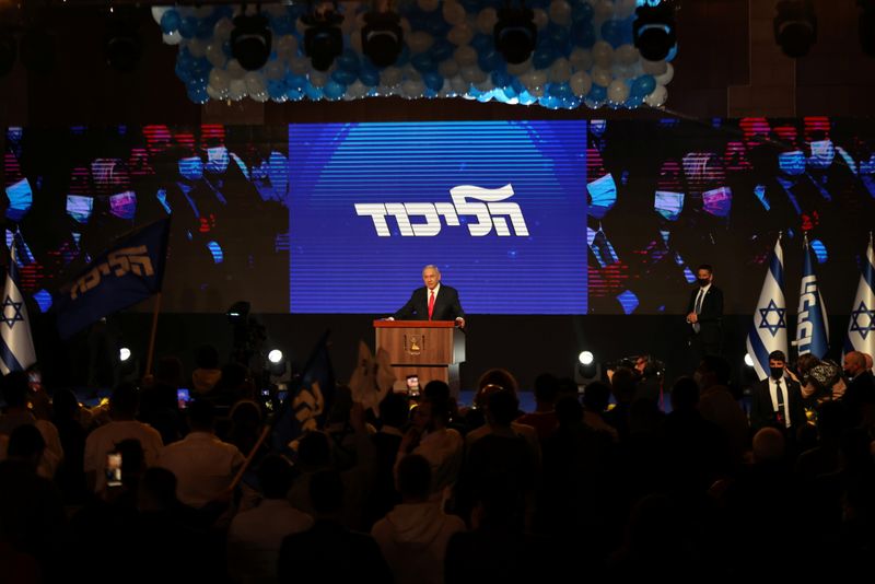 Israeli Prime Minister Benjamin Netanyahu delivers a speech to supporters