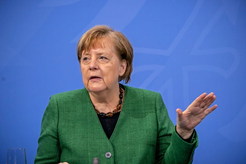 German Chancellor Angela Merkel attends a news conference after discussing