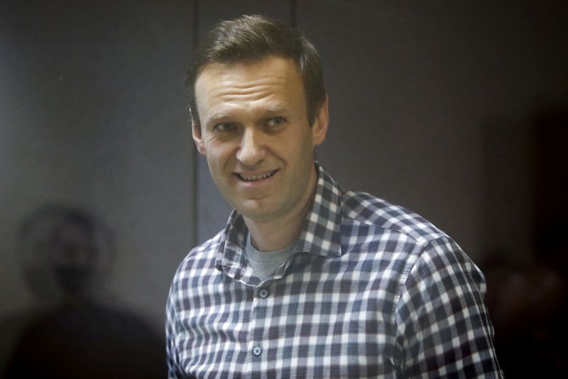 FILE PHOTO:  Russian opposition politician Alexei Navalny attendsa court