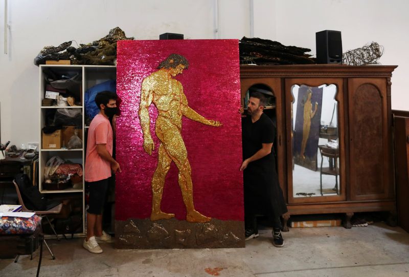 Argentine artist Marcelo Toledo works on art pieces for the
