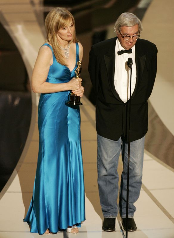 Writers Ossana and McMurtry accept the Oscar for best adapted