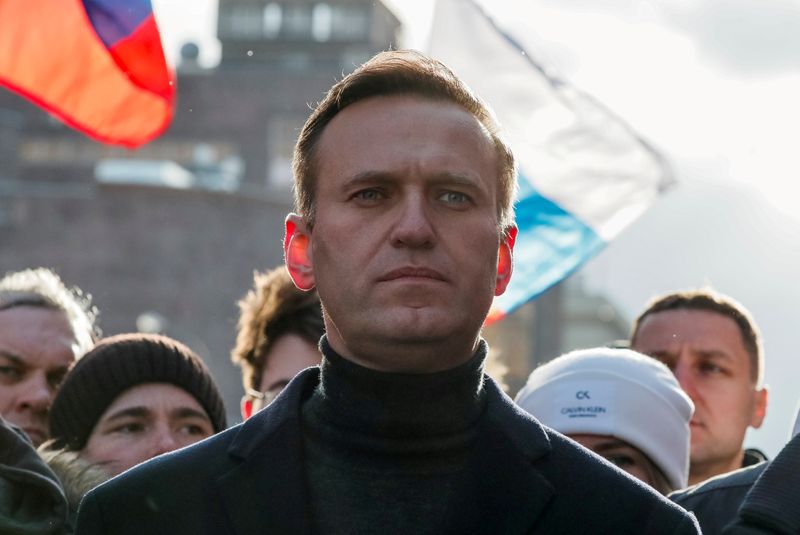 FILE PHOTO: Russian opposition politician Alexei Navalny takes part in