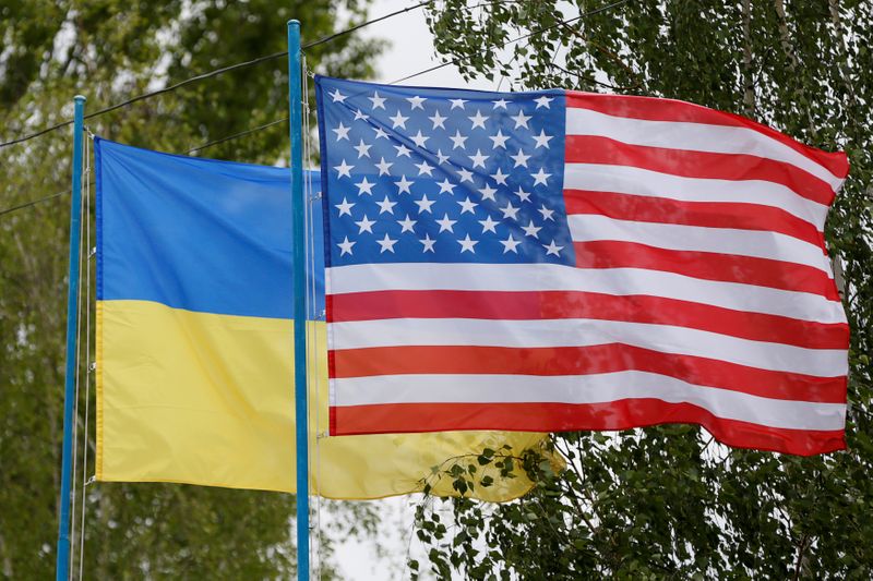 National flags of Ukraine and U.S. fly at compound of