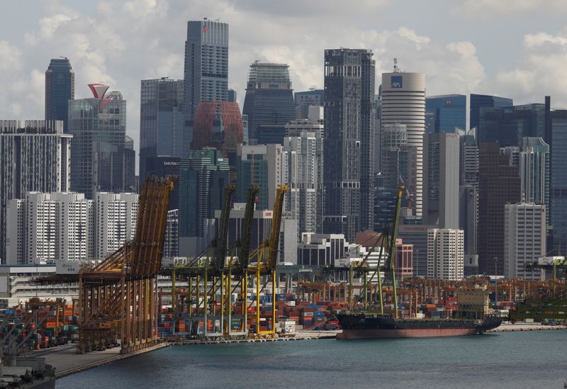 FILE PHOTO: A ship docks at Keppel terminal in Singapore