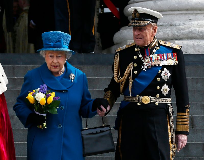 Britain’s Queen Elizabeth and Prince Philip leave after the Afghanistan
