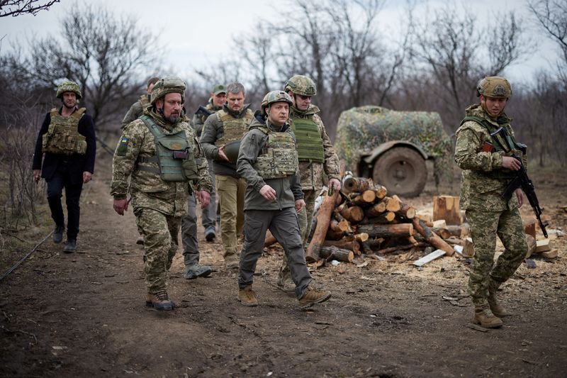 FILE PHOTO: Ukraine’s President Volodymyr Zelenskiy visits positions of armed