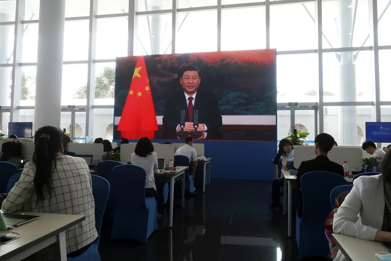 Chinese President Xi Jinping delivers via video link a keynote
