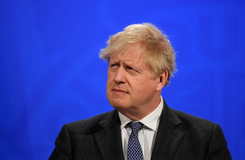Britain’s PM Johnson holds a news conference, in London
