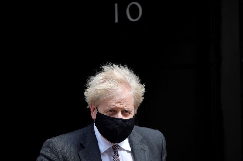 FILE PHOTO: Britain’s Prime Minister Boris Johnson leaves Downing Street
