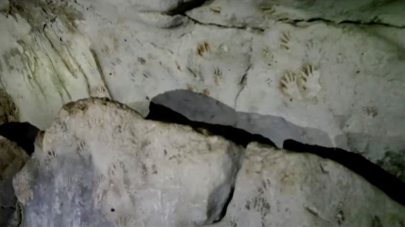 Hand prints, reportedly 1,200 years old, are seen on the