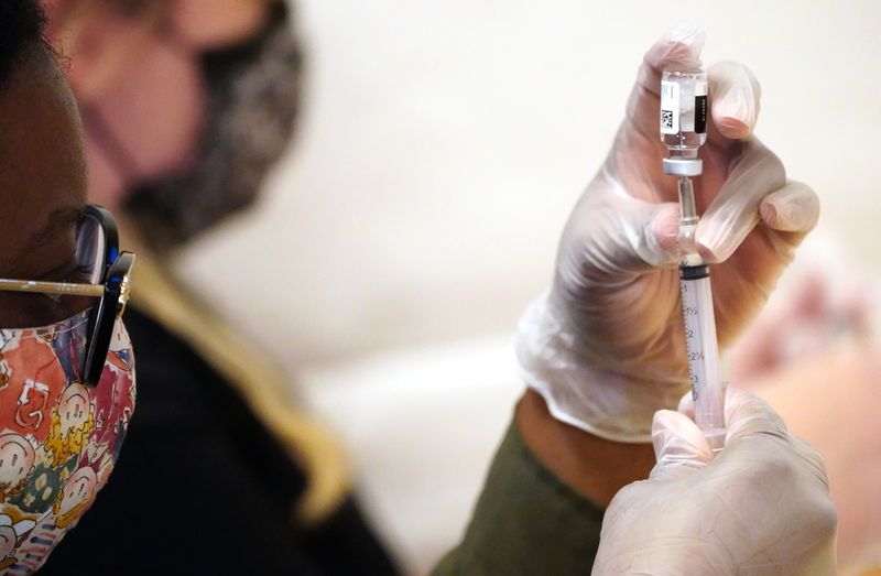 Healthcare worker prepares Johnson & Johnson vaccination for the coronavirus
