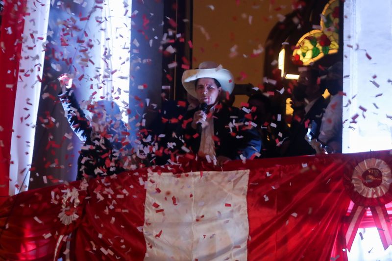 Leftist Pedro Castillo celebrates after Peru’s electoral authority announced him