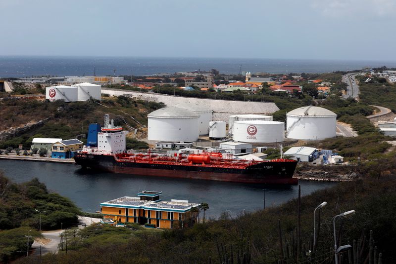 FILE PHOTO: A crude oil tanker is docked at Isla