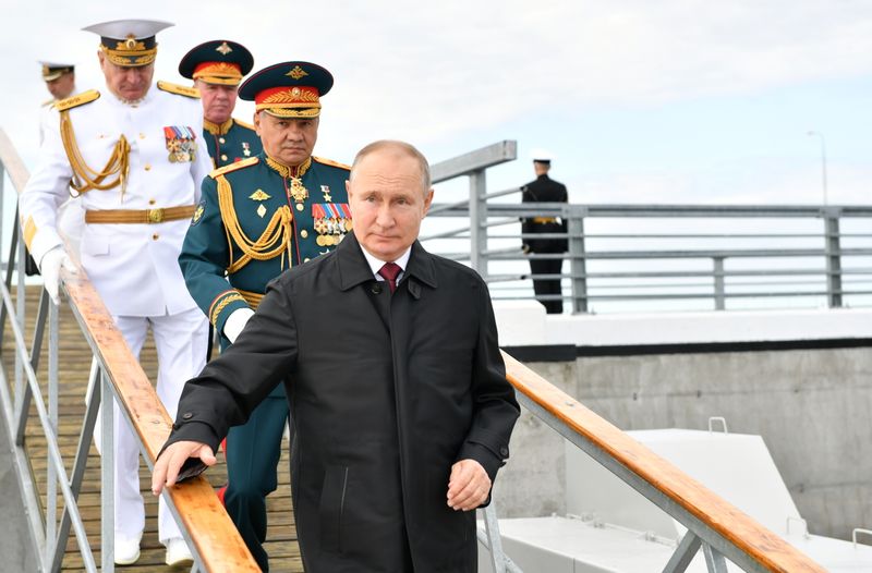 Russia’s President Putin attends the Navy Day parade in Saint