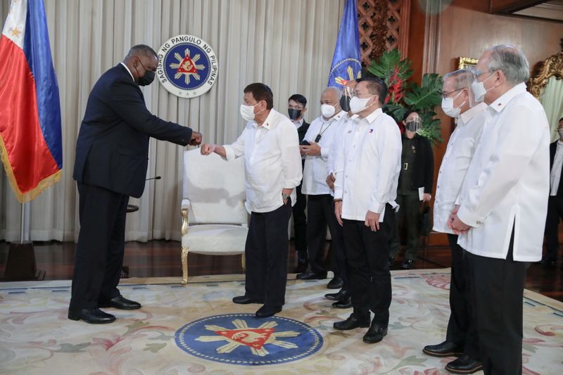 U.S. Secretary of Defense Austin with Philippine President Duterte in