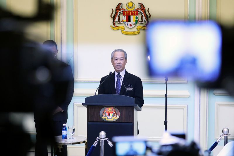 Malaysia’s Prime Minister Muhyiddin Yassin speaks during his cabinet announcement