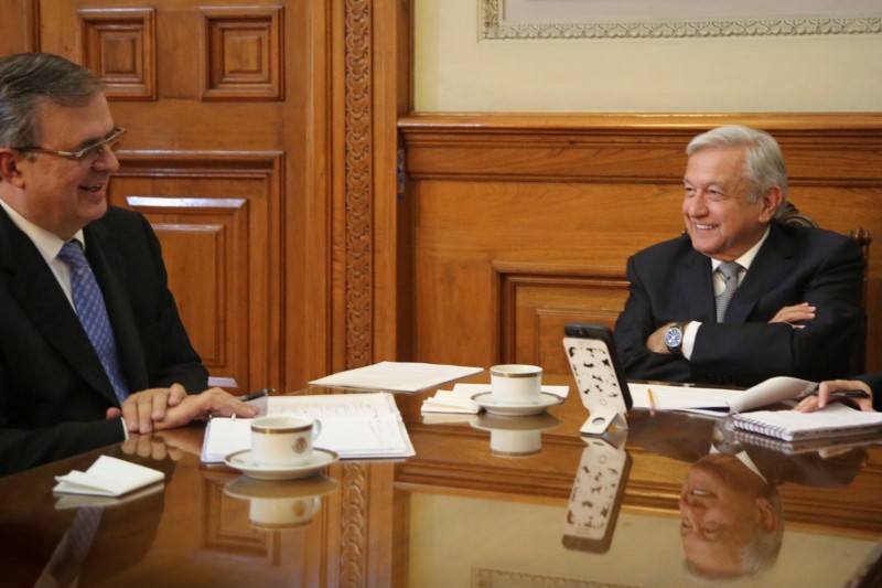 Mexican President Andres Manuel Lopez Obrador holds a call with