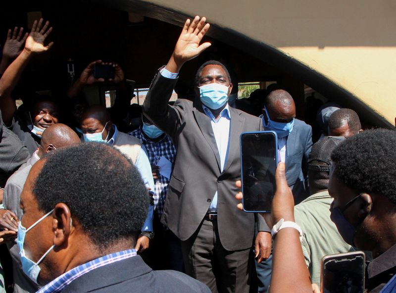 Opposition UPND party’s presidential candidate Hakainde Hichilema waves to supporters