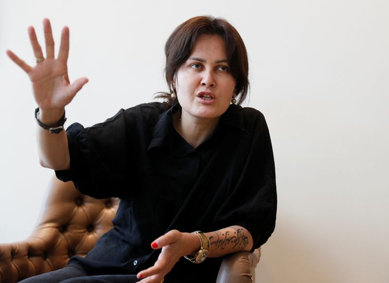 Afghan filmmaker Sahraa Karimi speaks during an interview with Reuters