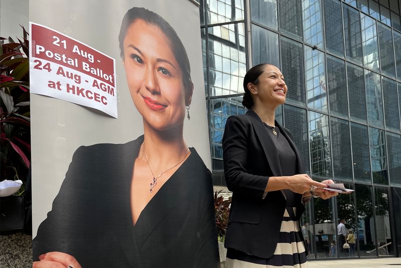 Selma Masood, candidate for Hong Kong Law Society’s election, hands