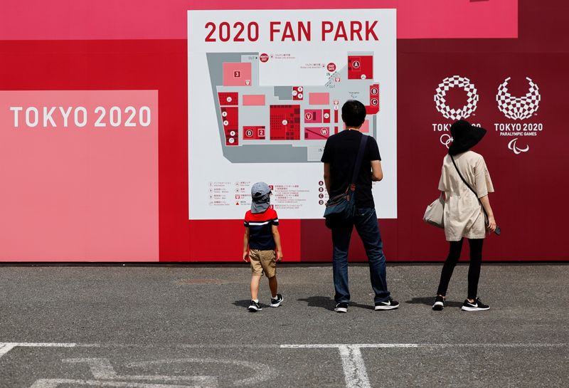 Visitors are seen at 2020 Fan Park, amid the coronavirus