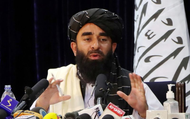 FILE PHOTO: Taliban spokesman Zabihullah Mujahid speaks during a news