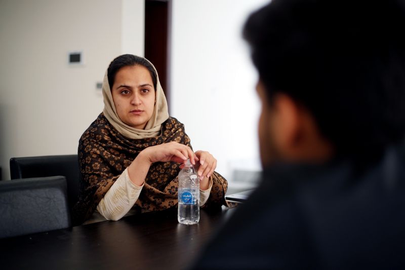 Afghan news anchor Beheshta Arghand speaks to her brother at