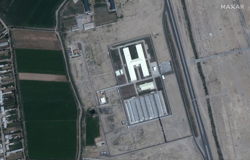 A satellite image shows the Uzbek camp just across the