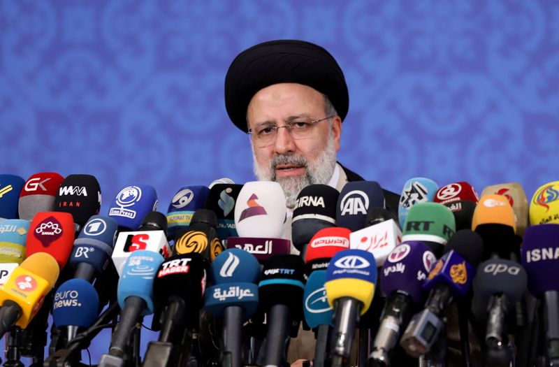 FILE PHOTO: Iran’s Ebrahim Raisi speaks during a news conference