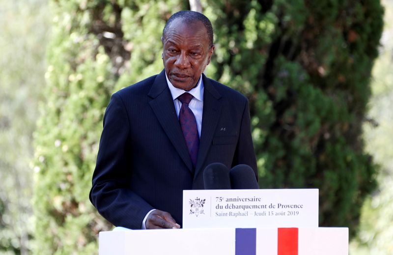 FILE PHOTO: Guinean President Alpha Conde delivers a speech