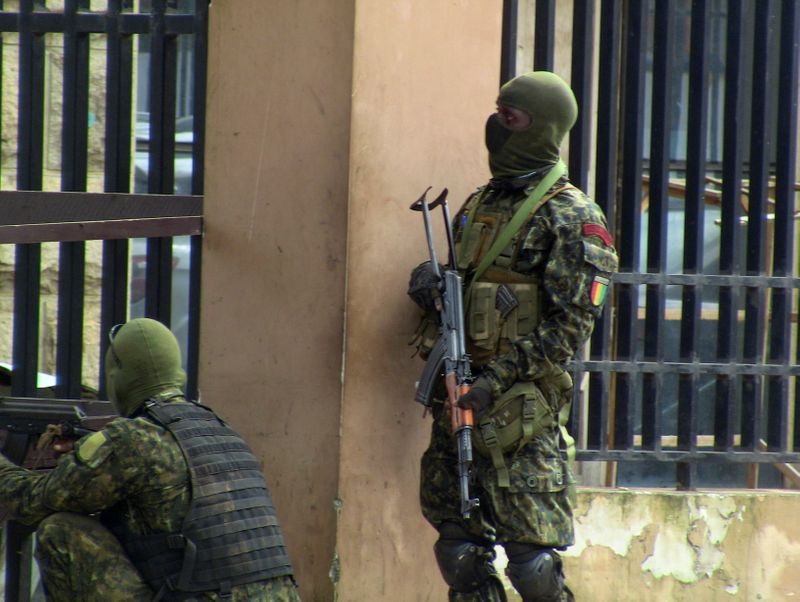 FILE PHOTO: Special forces members take position during an uprising