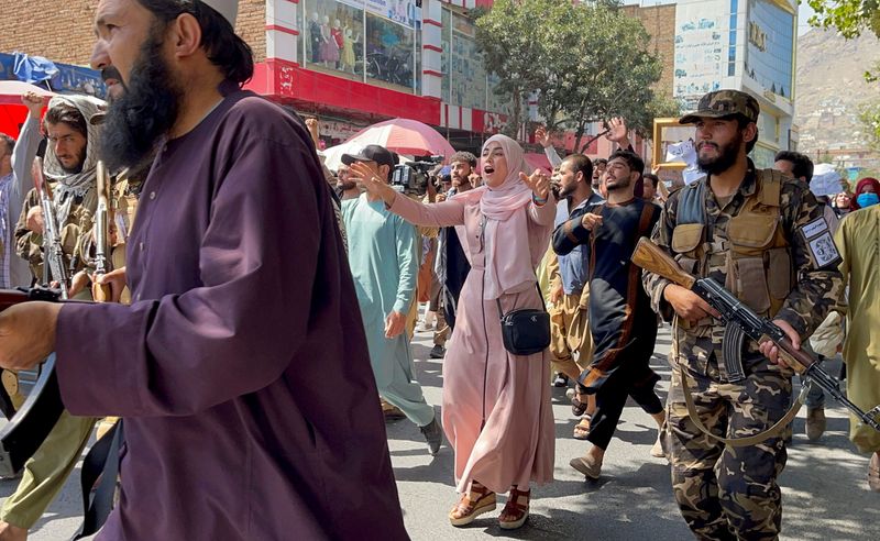 Afghan demonstrators shout slogans during an anti-Pakistan protest, near the