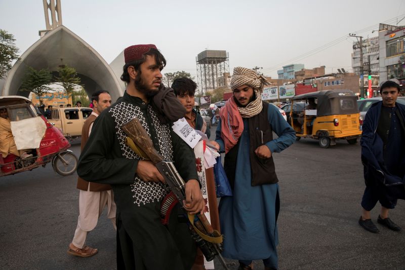 FILE PHOTO: Taliban soldiers are seen in a street in
