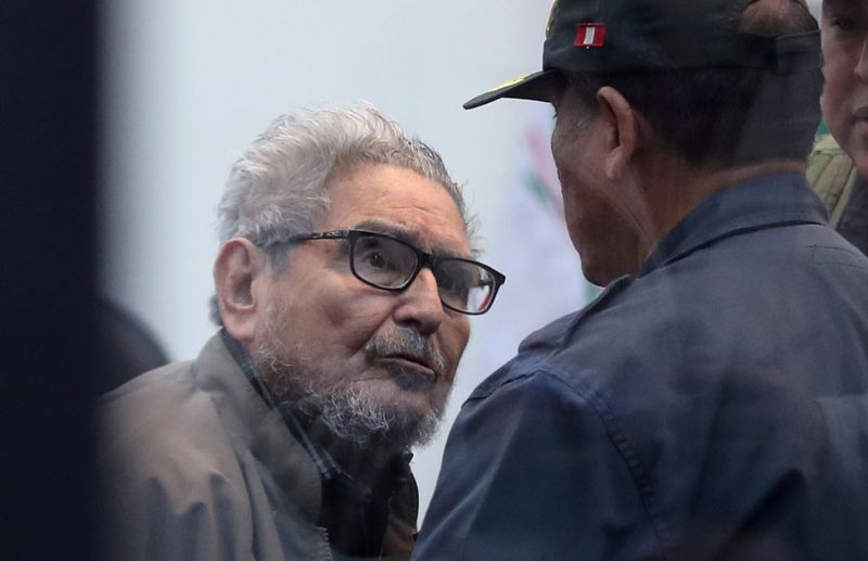 FILE PHOTO: Shining Path founder Abimael Guzman attends a trial