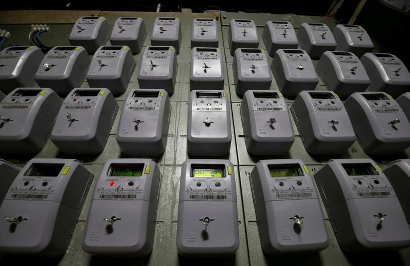FILE PHOTO: Electric meters of an apartment building are seen