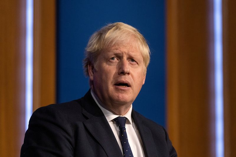 FILE PHOTO: Britain’s PM Johnson holds news conference on winter