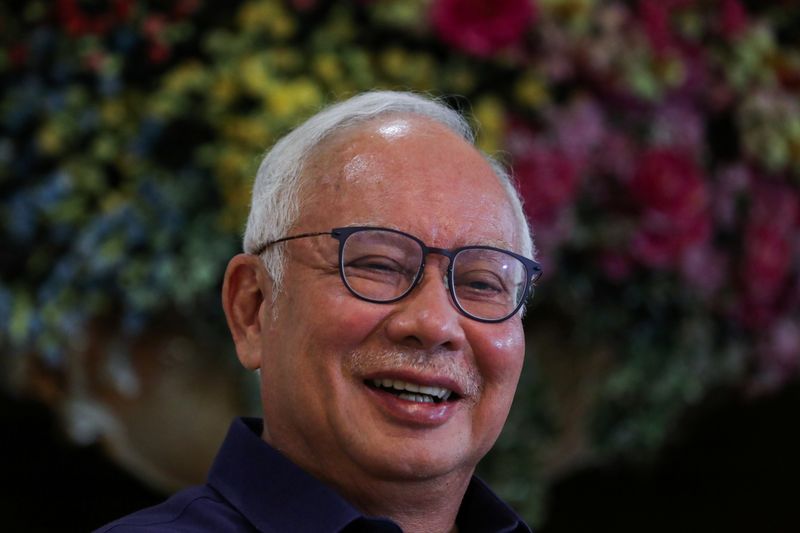 Malaysia’s former Prime Minister Najib Razak reacts during an interview