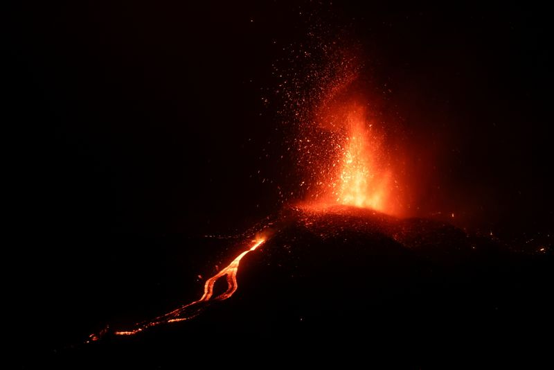 Lava flows following the eruption of a volcano on the